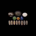 Greek and Other Bead Group
Late 1st millennium BC and later. A mixed group of stone beads and plaques in banded agate, lapis lazuli, agate and other ...
