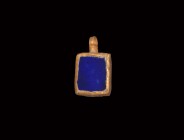 Greek Hellenistic Gold Pendant
2nd-1st century BC. A gold pendant formed as rectangular lapis lazuli plaque within a plain gold frame, collared suspe...