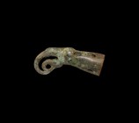 Scythian Drinking Horn Terminal
6th century BC-3rd century AD. A bronze horn terminal with tapering socket, domed eyes, openwork curled beak. 92 gram...