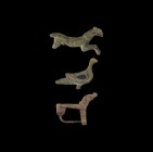 Roman Plate Brooch Collection
Mainly 2nd century AD. A mixed group of bronze plate brooches comprising: a running hound with legs extended; a standin...