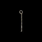 Roman Twisted Cosmetic Applicator
1st-3rd century AD. A glass applicator of twisted glass rod with disc finial and loop handle, iridescent surface. C...