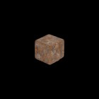Roman Ox Bone Dice
1st-3rd century AD. A substantial cuboid bone dice with carved ring-and-dot spots to each face arranged 1:6, 2:5, 3:4. 4.4 grams, ...