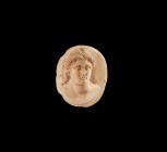 Roman Female Portrait Cameo
1st century BC-1st century AD. A stone cameo comprising an oval plaque with female bust modelled in high relief; head tur...