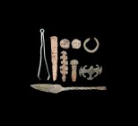 Roman Artefact Group
1st-3rd century AD. A mixed group comprising: a pair of bronze tweezers; a bronze dress pin; a bronze probe with twisted shank; ...
