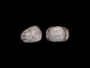 Roman Silver Ring with 'VOT / HER'
3rd-4th century AD. A silver ring comprising a D-section hoop with ribbed outer face, discoid plaque with possibly...