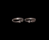 Roman Silver Dolphin Ring
1st-2nd century AD. A silver ring with D-section hoop forming a dolphin's body, tail to one end, stylised head to the other...