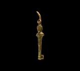 Roman Figural Lock Hasp
1st-2nd century AD. A bronze lock hasp in the shape of a herm wearing a headdress, genitalia on the column, the shoulders for...