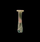 Roman Miniature Glass Vessel
2nd century AD. A tiny unguentarium in iridescent glass with rounded underside and everted rim. 2.28 grams, 34mm (1 1/2"...