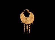 Roman Gold Earring with Bust of an Empress
2nd century AD. A gold earring comprising a crescentic plaque with repoussé panel, ropework border and app...