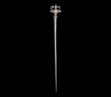 Roman Silver Urn-Headed Dress Pin
1st-2nd century AD. A silver dress pin with tapering round-section shank, finial formed as an urn with hatched body...