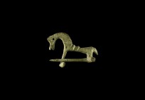 Roman Horse Brooch
2nd century AD. A bronze zoomorphic brooch with the bow formed as the body and legs of a horse, transverse bar beneath the hindleg...