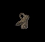Roman Phallic Pendant
1st-2nd century AD. A substantial bronze pendant in the form of an abdomen with erect penis and testicles below, suspension loo...