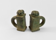 Roman Pomegranate Chariot Fitting Pair
2nd-3rd century AD. A matched pair of chariot fittings, each a square-section socle with stepped top and botto...