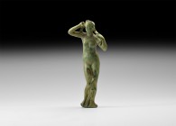 Roman Venus Statuette
2nd century AD. A bronze statuette of standing nude Venus (Greek Aphrodite) modelled in the round, the head slightly turned to ...