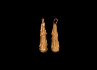Roman Gold Hercules Earring Pendant Pair
1st century BC-1st century AD. A matched pair of hollow-formed gold earrings, each a tapering club of Hercul...