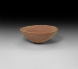 Roman Redware Bowl
1st century AD. A well-preserved thick ceramic redware bowl with dished base and ribbed exterior, rounded rim. See Greene, K. Roma...