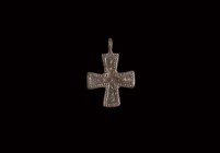 Byzantine Cross Pendant
5th-8th century AD. A silvered bronze equal-armed cross pendant, raised border with incised dots, raised pellets to each arm ...