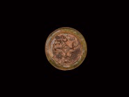 Byzantine Glass Seal with Monogram
8th-10th century AD. An iridescent glass seal impressed to one side with a complex monogram. 1.87 grams, 21mm (7/8...