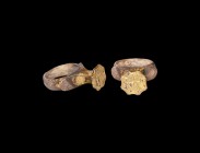 Byzantine Large Gilt Silver Ring with Monogram
9th century AD. A substantial parcel-gilt silver ring with keeled hoop and bulb to the underside, flar...