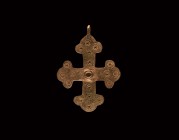 Byzantine Cross Pendant
11th-12th century AD. A bronze cross pendant with integral suspension loop, the arms with trefoil-shaped finials and ring-and...