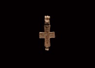 Byzantine Reliquary Cross Pendant
5th-8th century AD. A bronze reliquary cross pendant, high relief image of Christ crucified to one face, Christ ris...
