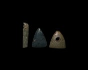 Western Asiatic Polished Stone Implement Group
1st millennium BC. A group of three polished stone items: a triangular plectrum(?), a pierced triangul...