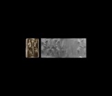 Western Asiatic Babylonian Cylinder Seal with Lions and Ibex
2nd millennium BC. A large black agate cylinder seal engraved with a pair of rearing lio...