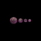 Western Asiatic Amethyst Melon Bead Set
2nd millennium AD. A set of four skilfully carved ribbed amethyst melon beads in graduating sizes. 24.8 grams...