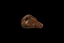 Western Asiatic Carved Duck Weight
1st millennium BC. A carved limestone weight formed as a duck with the head laid along the spine, pierced for susp...