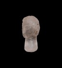 Western Asiatic Rock Crystal Head
Early 1st millennium AD. A carved rock crystal female head with graceful facial features and wavy hair; over-length...