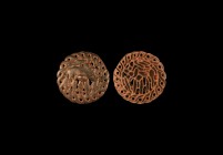 Large Western Asiatic Stamp Seal with Animal
2nd millennium BC. A large bronze seal matrix with openwork guilloche border and central figure of a zeb...