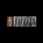 Western Asiatic Early Dynastic III Cylinder Seal with Contest Scenes
27th-24th century BC. A jasper cylinder seal with three groups in contest: a rea...