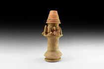 Western Asiatic Decorated Finial
1st millennium BC. A tall tubular ceramic stupa finial(?) with biconical collar, ledge with applied fruit, bird, lot...