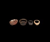 Western Asiatic Finger Ring Group
1st millennium AD. A mixed group of finger rings comprising: one iron with inset jasper intaglio of a standing figu...