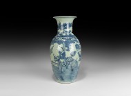 Chinese Blue and White Vase
20th century AD. A glazed ceramic vase with trumpet-shaped mouth, frieze depicting a nobleman riding a horse(?) in a land...