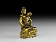 Tibetan Gilt Erotic Sitting Buddha Statuette
20th century AD. A gilt-bronze figure of Chakra Samvara seated cross-legged on a lotus-flower base with ...