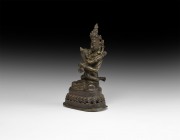 Tibetan Chakra Samvara Statuette
19th-20th century AD. A bronze figure of Chakra Samvara seated cross-legged on an openwork lotus-flower base with hi...
