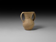 Chinese Neolithic Two-Handled Jar
3rd millennium BC. A ceramic jar comprising a biconvex body, flared neck with rounded rim, two lateral strap handle...