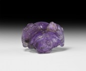 Chinese Bears Statuette
19th century AD. A carved amethyst figure of two bears posed symmetrically, each with its chin resting on the rump of the oth...