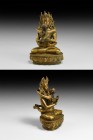 Tibetan Gilt Chakra Samvara Figure
20th century AD. A gilt-bronze figure of Chakra Samvara seated cross-legged on a lotus-flower base with his partne...