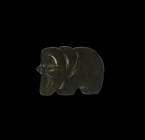 Chinese Qing Carved Jade Bear
Qing Dynasty, 19th-20th century AD. A jade stylised bear with engraved lines to delineate the legs and head; small ears...