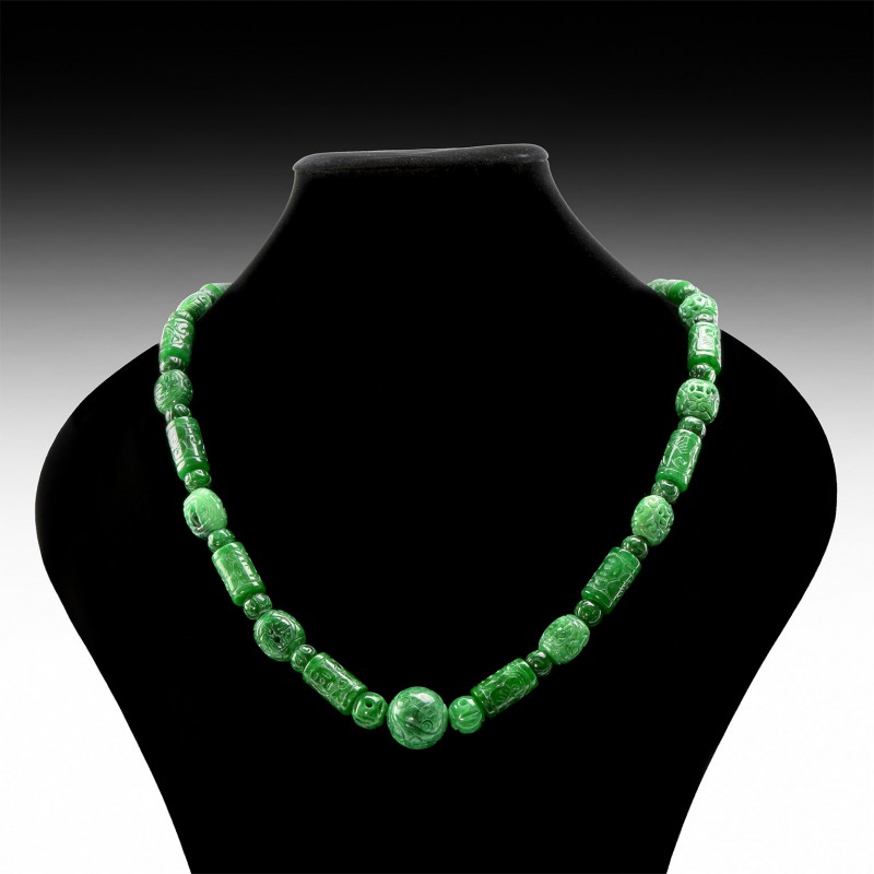 Chinese Jade Bead Necklace
Early 20th century AD. A necklace of cylindrical jad...