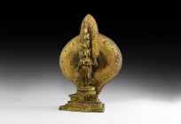 Sino-Tibetan Gilt Goddess with Nimbus
19th-20th century AD. A gilt bronze figure of Avalokiteshvara with eleven heads in tiers and eight arms display...