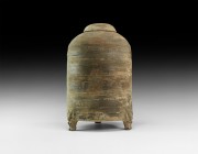 Chinese Han Lidded Jar
Han Dynasty, 206 BC-220 AD. A substantial tubular ceramic jar with domed upper face, circumferential ribbed bands, broad domed...