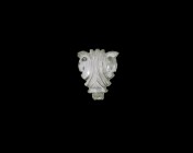 Chinese Rock Crystal Amuletic Pendant
19th century AD. A carved rock crystal floral amuletic pendant, pierced for suspension. 11 grams, 34mm (1 1/4")...