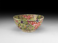 Chinese Enamelled Bowl
20th century AD. A deep hemispherical famille rose ceramic bowl with basal ring, textured pointillé surface with reserved poly...