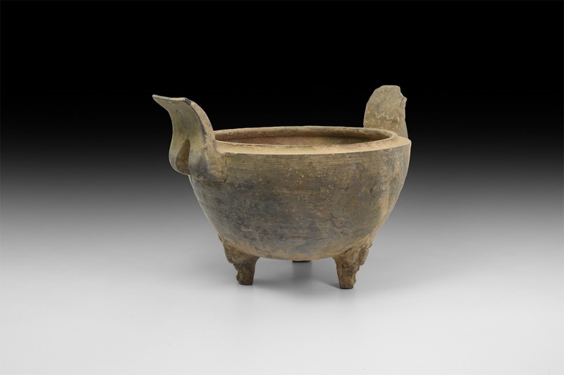 Chinese Han Two-Handled Vessel
Han Dynasty, 206 BC-220 AD. A ceramic bowl compr...