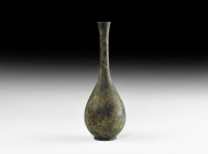 Chinese Song Bronze Vase
Song Dynasty, 960-1127 AD. A bronze footed vessel with bulbous body, tall neck with flared rim, stamped rectangular panel wi...