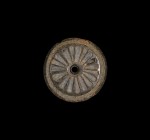 Indus Valley Wheel Model or Seal Matrix
12th-8th century BC. A serpentine model wheel with felloe and spoke details to one face; accompanied by an ol...