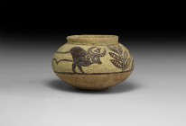 Indus Valley Mehrgarh Painted Vessel with Animals
3rd millennium BC. A ceramic biconvex jar with chamfered rim, painted frieze of advancing zebus and...